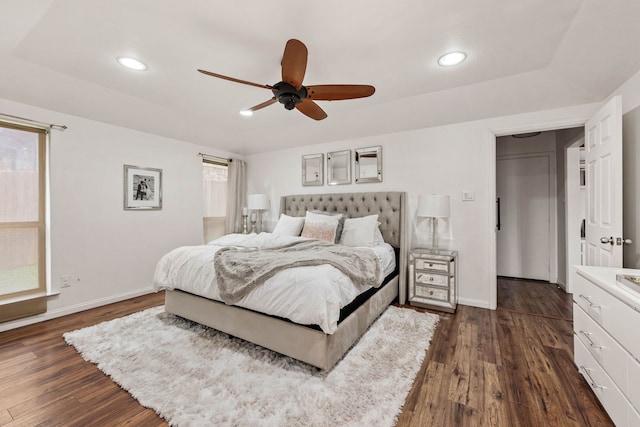 bedroom featuring ceiling fan and dark hardwood / wood-style flooring