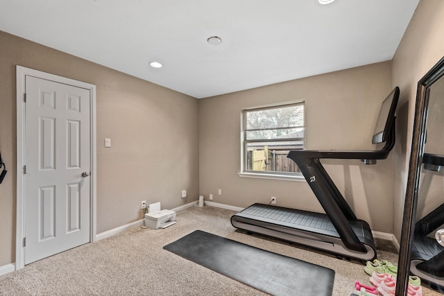 exercise room featuring carpet