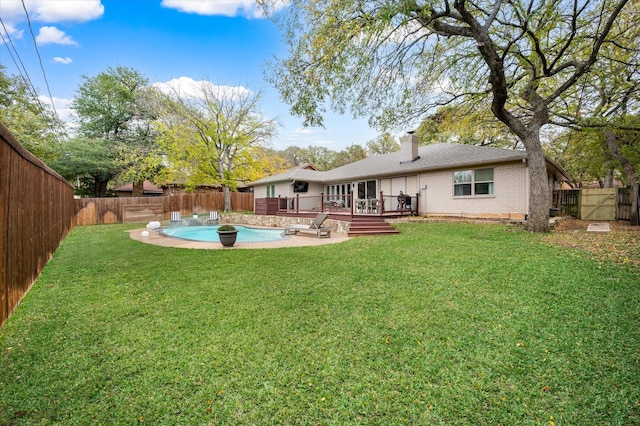 exterior space featuring a swimming pool side deck