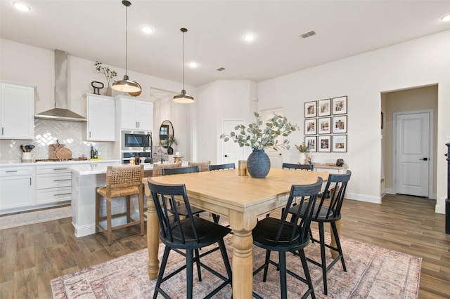 dining room featuring dark hardwood / wood-style floors