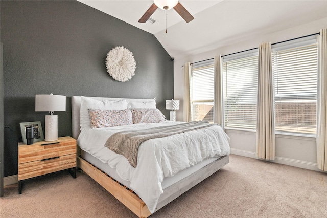 bedroom with lofted ceiling, carpet flooring, and ceiling fan