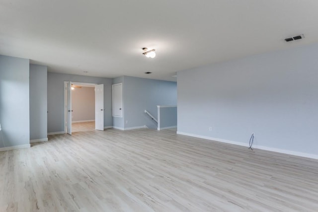 empty room with light wood-type flooring