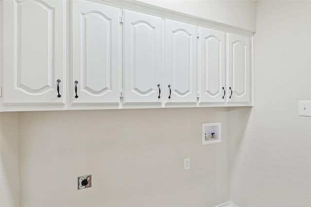 laundry room featuring washer hookup, cabinets, and hookup for an electric dryer