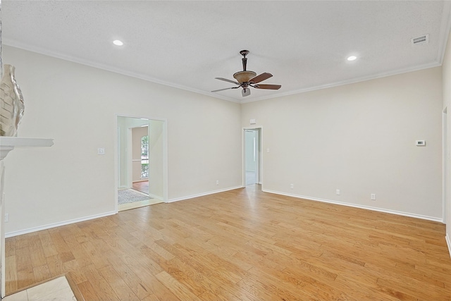 unfurnished room featuring crown molding, ceiling fan, and light hardwood / wood-style flooring