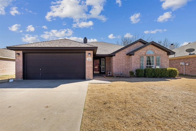 ranch-style home with a garage