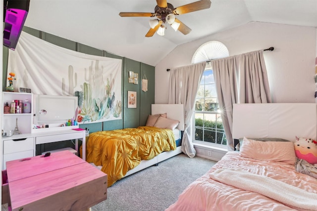 carpeted bedroom featuring ceiling fan and lofted ceiling