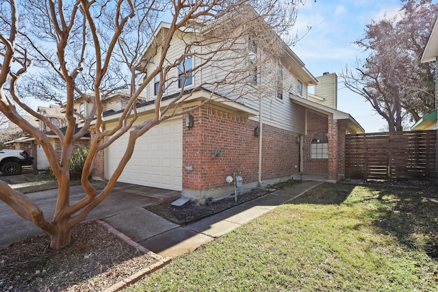 view of side of property with a garage and a lawn