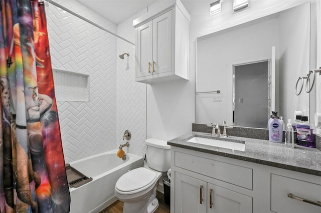 full bathroom featuring vanity, toilet, and shower / bath combo with shower curtain