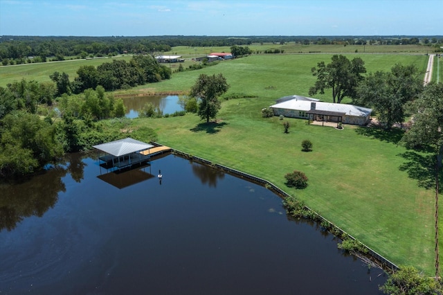 bird's eye view featuring a water view and a rural view