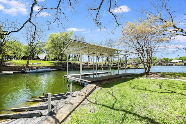 view of dock featuring a water view and a lawn