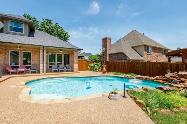 view of pool featuring a patio area