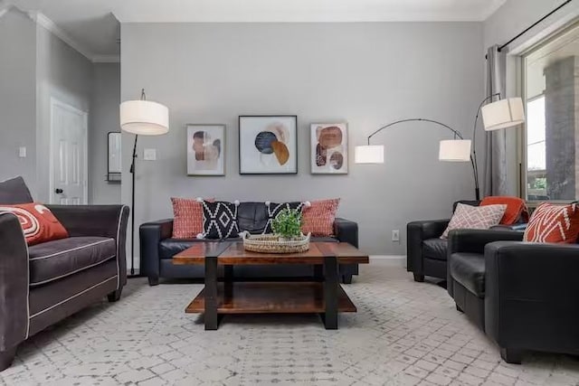 carpeted living room featuring ornamental molding