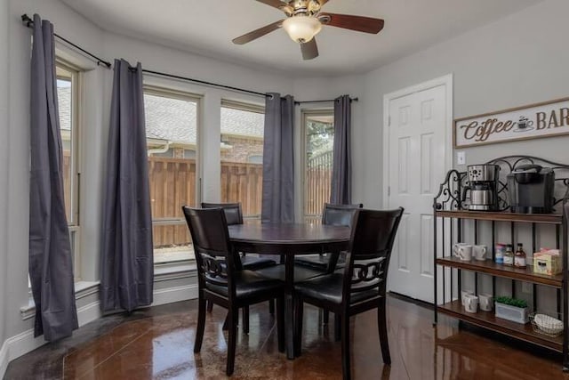 dining space featuring ceiling fan