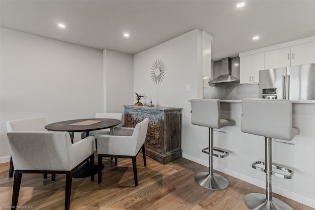 dining space featuring dark hardwood / wood-style floors