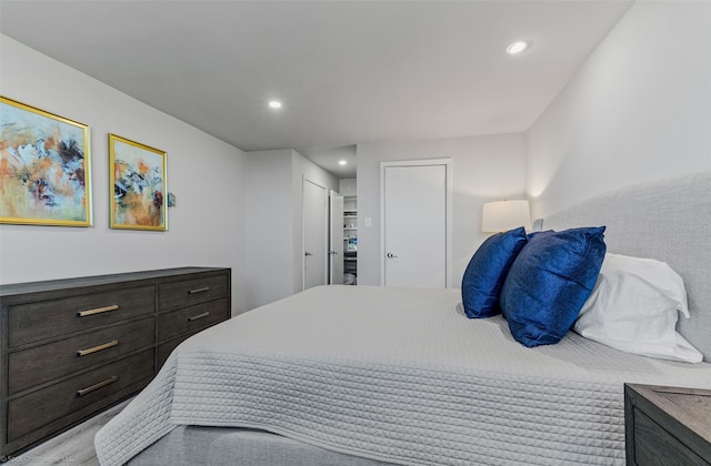 bedroom with light hardwood / wood-style floors