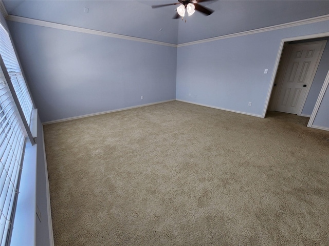 unfurnished room featuring light carpet, crown molding, and ceiling fan