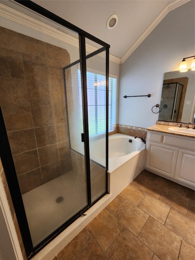 bathroom featuring crown molding, lofted ceiling, shower with separate bathtub, and vanity