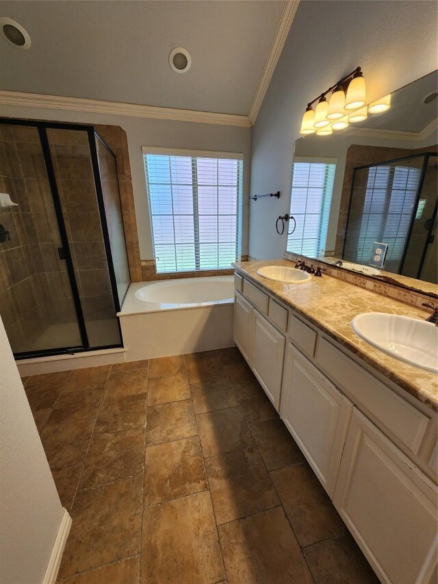 bathroom with ornamental molding, vanity, and plus walk in shower