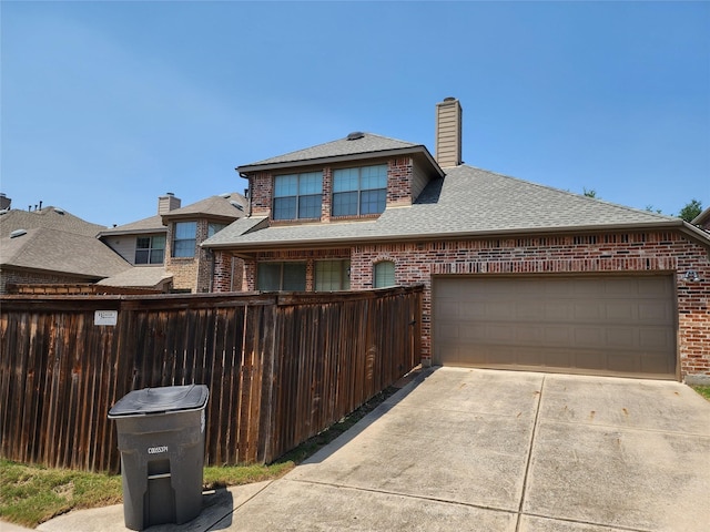 view of front of house with a garage