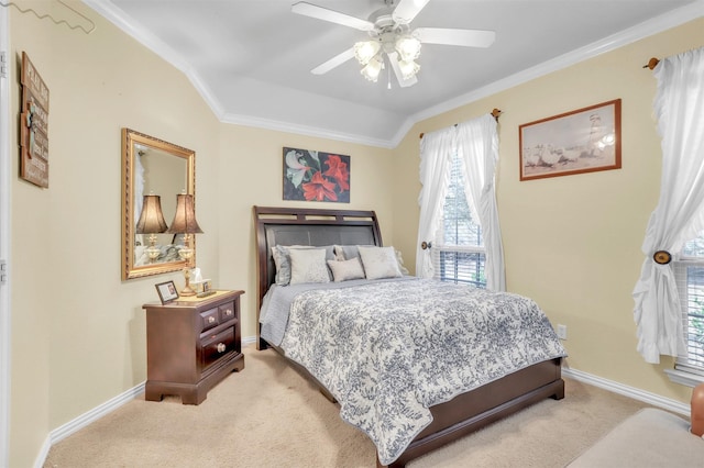 bedroom with crown molding, ceiling fan, and light carpet