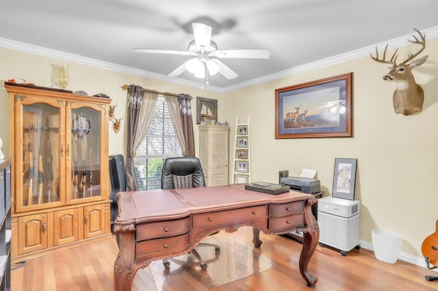 office with ornamental molding, light hardwood / wood-style floors, and ceiling fan