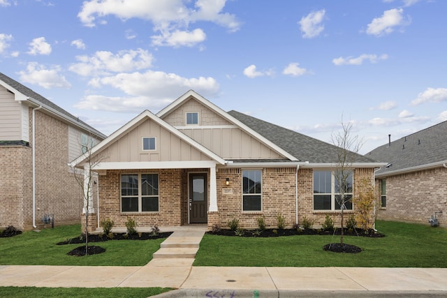 craftsman inspired home with a front yard