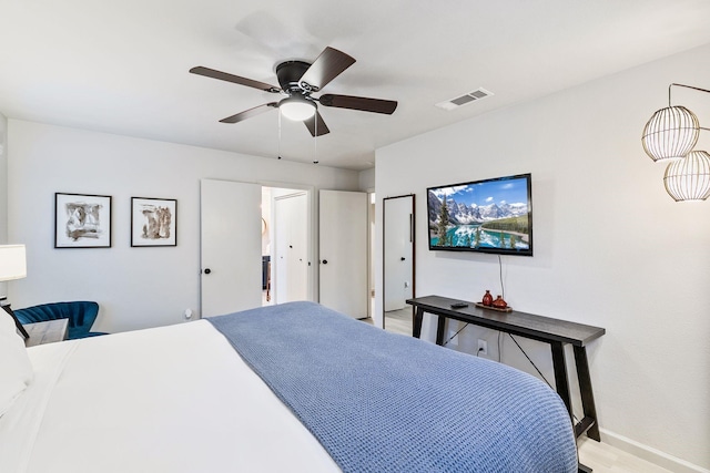 bedroom featuring ceiling fan and light wood-type flooring