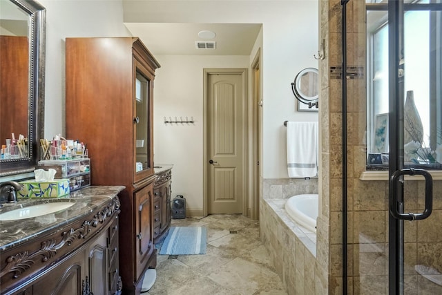 bathroom with vanity and plus walk in shower