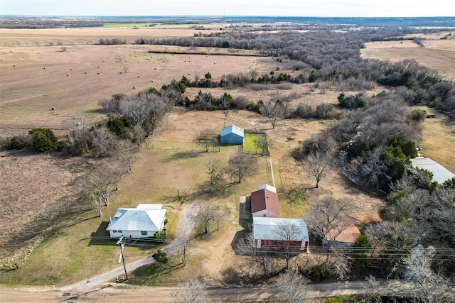 birds eye view of property featuring a rural view