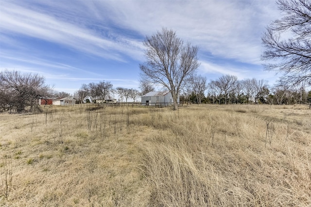 view of yard featuring a rural view