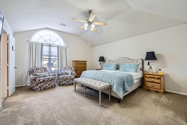 bedroom featuring lofted ceiling, ceiling fan, and carpet flooring