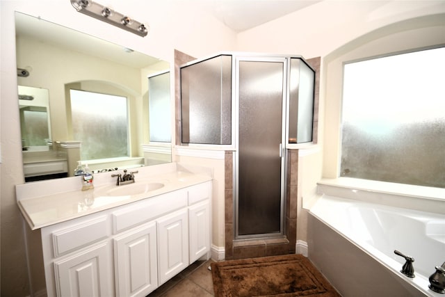 bathroom with vanity, separate shower and tub, and tile patterned flooring