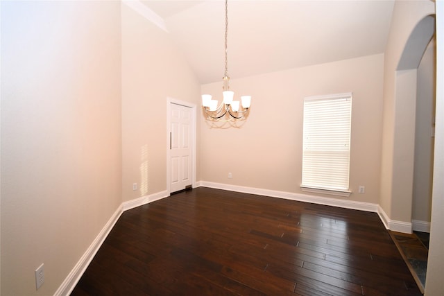 unfurnished room featuring an inviting chandelier, high vaulted ceiling, and dark hardwood / wood-style floors