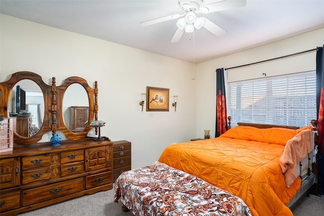 bedroom featuring ceiling fan and carpet floors