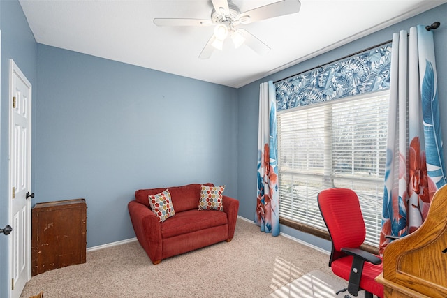 office space featuring light colored carpet and ceiling fan