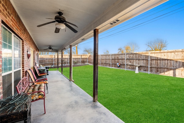 exterior space featuring ceiling fan