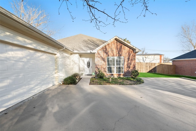 exterior space with a garage