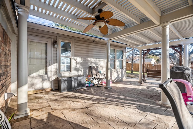 view of patio / terrace with a pergola and ceiling fan