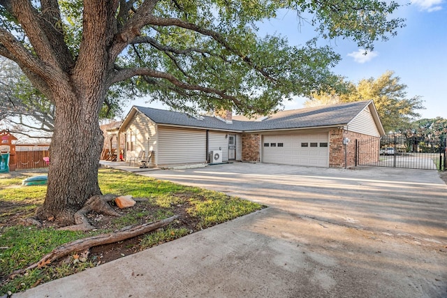 single story home featuring a garage