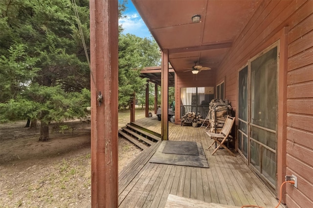 wooden deck with ceiling fan