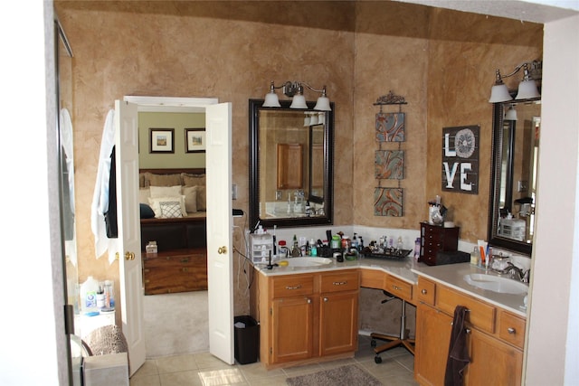 bathroom featuring tile patterned floors and vanity