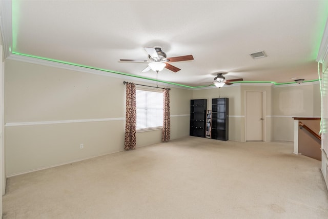 713 Devontree Ct, Fort Worth, TX 76052 - empty room with a ceiling fan, carpet floors, ornamental molding, and visible vents