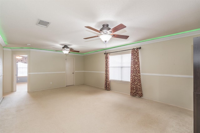 713 Devontree Ct, Fort Worth, TX 76052 - empty room featuring carpet flooring, a ceiling fan, plenty of natural light, and visible vents