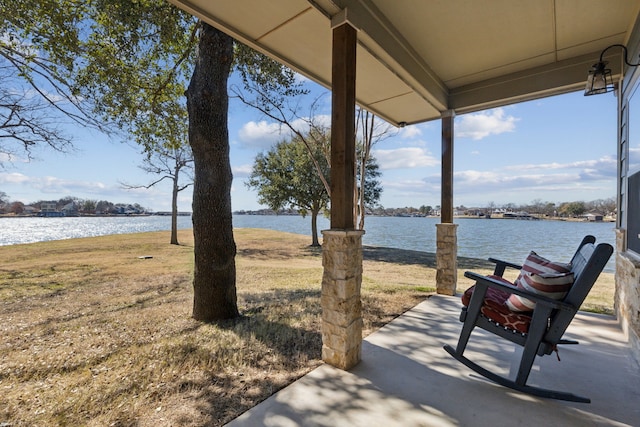 view of patio / terrace with a water view