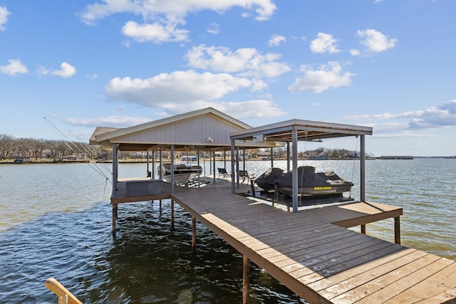 dock area with a water view