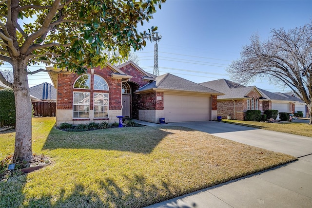 ranch-style house featuring a garage and a front lawn