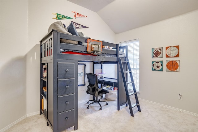 carpeted bedroom with vaulted ceiling