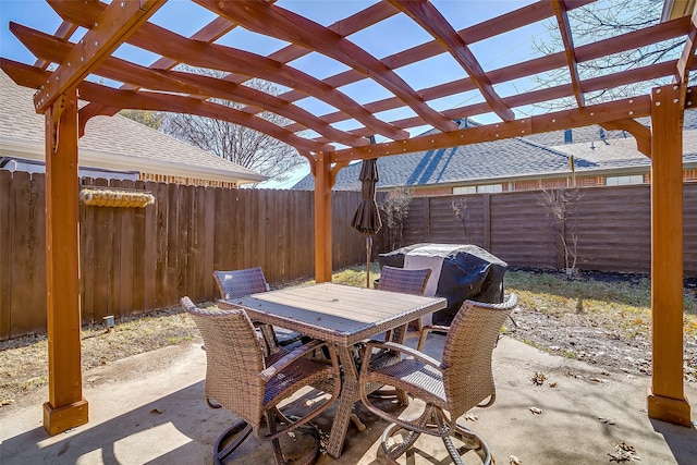 view of patio / terrace with grilling area and a pergola