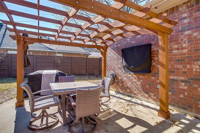 view of patio / terrace featuring a grill and a pergola