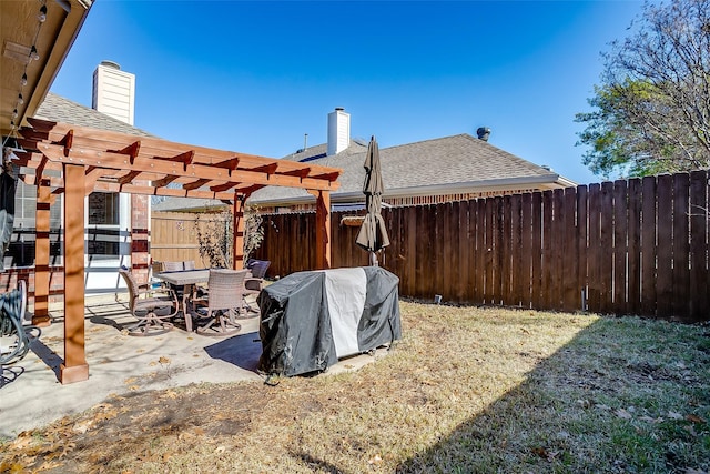 view of patio / terrace featuring a grill and a pergola